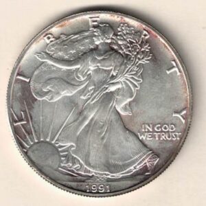 1991 Silver USA One Ounce Eagle. The liberty is on the obverse, The eagle is on the reverse. The coin contains one ounce of 999 fine silver.