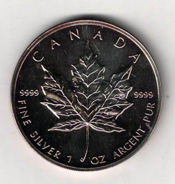 1999 Silver Canada One Ounce Maple. Elizabeth II is on the obverse, The Maple is on the reverse. The coin contains one ounce of 9999 fine silver.