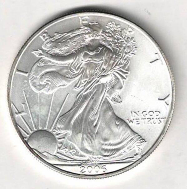 2006 Silver USA One Ounce Eagle. The liberty is on the obverse, The eagle is on the reverse. The coin contains one ounce of 999 fine silver.