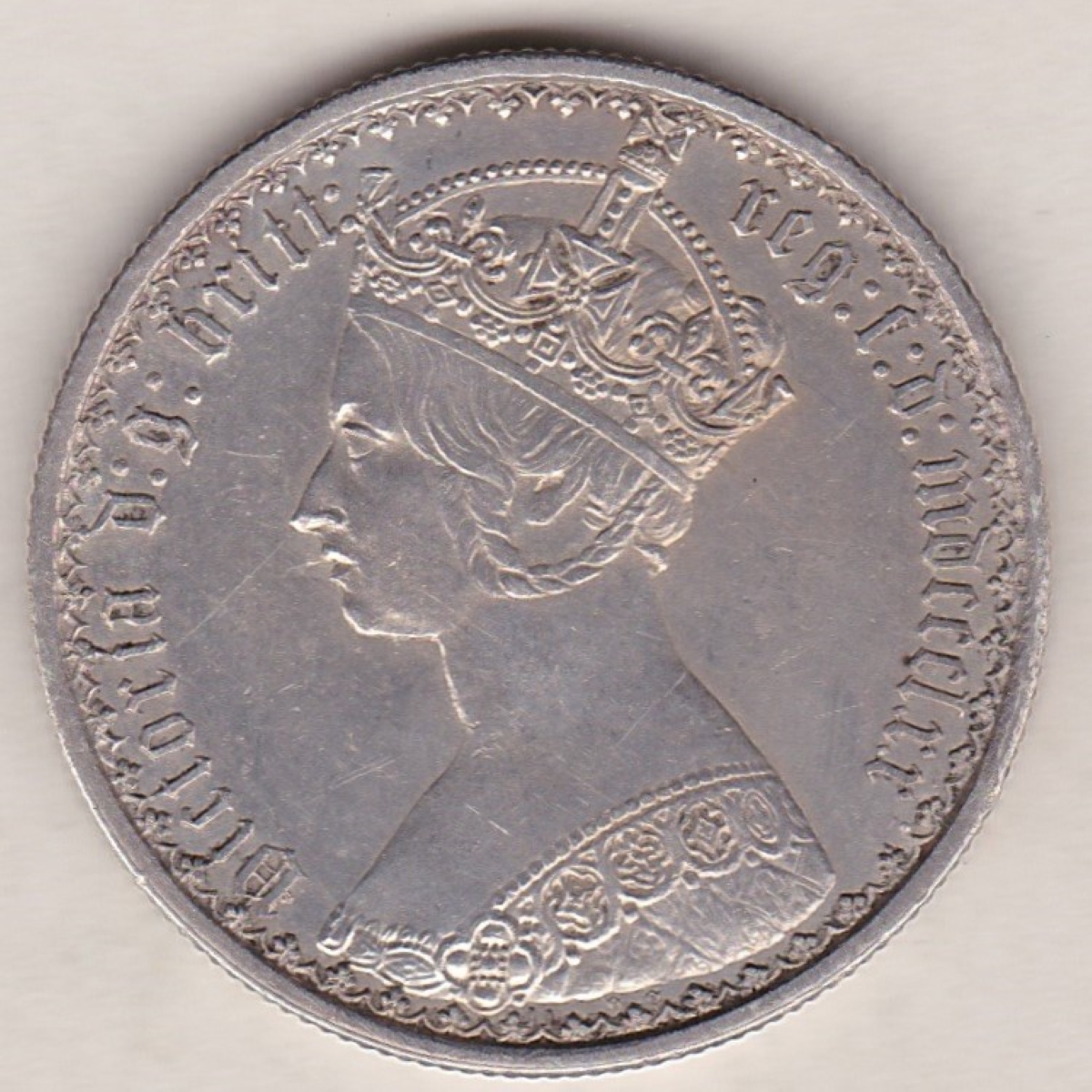 1870 Silver Gothic Florin Coin. The Obverse features a crowned bust of Queen Victoria. The Reverse features a shield with denomination.