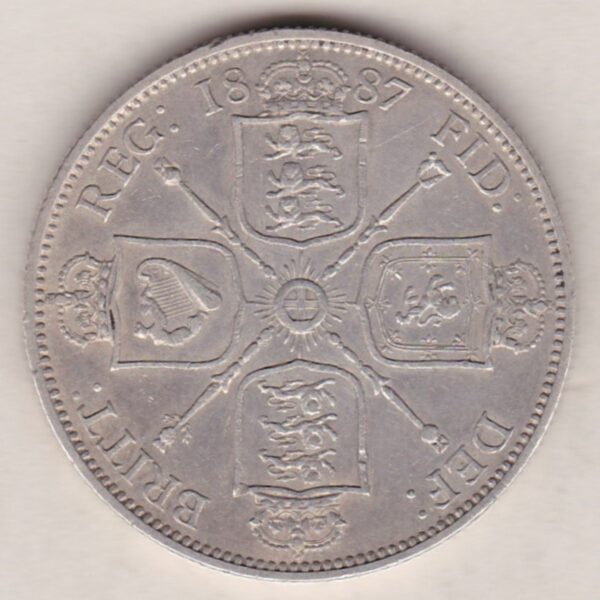 1887 Silver Florin coin. The portrait of Queen Victoria on the Obverse. With crowned cruciform shields of England, Scotland and Ireland on the reverse.