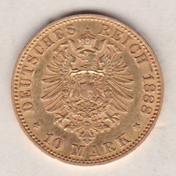 1888 A Germany Gold Ten Mark coin featuring the bust of Friedrich III on the obverse. The crowned imperial eagle on the reverse.