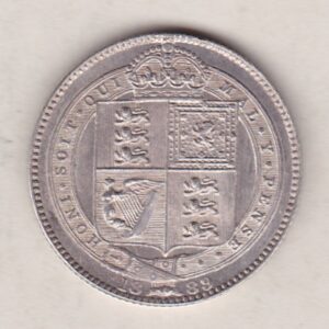 1889 Silver Shilling Large Head coin featuring Queen Victoria on the Obverse. The Reverse features the crowned Royal shield within Garter.