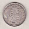 1891 Silver Shilling coin featuring Queen Victoria on the Obverse. The Reverse features the crowned Royal shield within Garter, with divided date below.