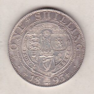 1893 Silver Shilling coin featuring Queen Victoria on the Obverse. The Reverse features the crowned shields of arms with national flower emblems between.