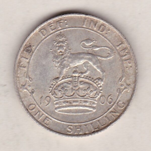 1906 Silver Shilling coin featuring King Edward VII on the Obverse. The Reverse features a crowned lion with date and denomination.