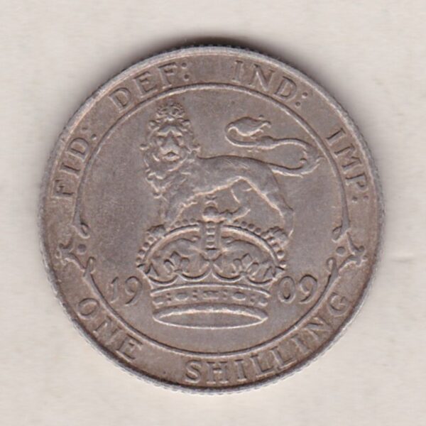 1909 Silver Shilling coin featuring King Edward VII on the Obverse. The Reverse features a crowned lion with date and denomination.