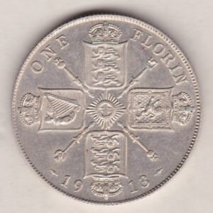 1913 Silver Florin coin. The portrait of King George V on the Obverse. The crowned cruciform shields around central Garter star on the reverse.