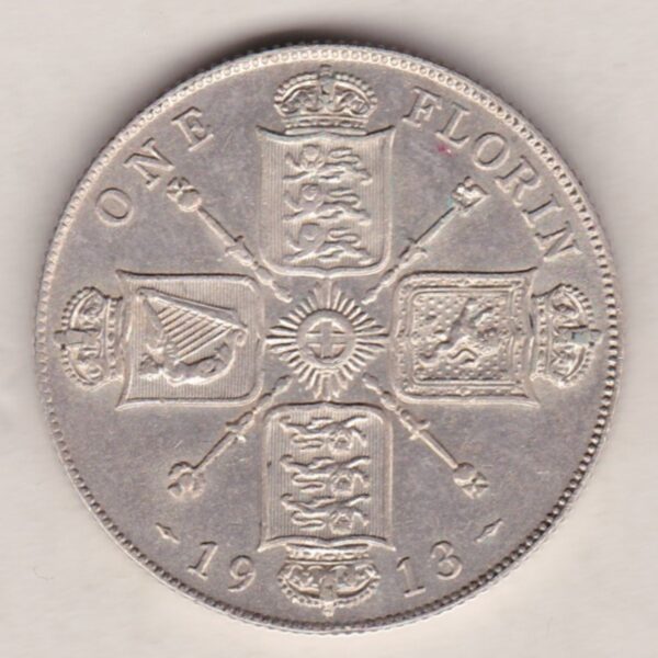 1913 Silver Florin coin. The portrait of King George V on the Obverse. The crowned cruciform shields around central Garter star on the reverse.