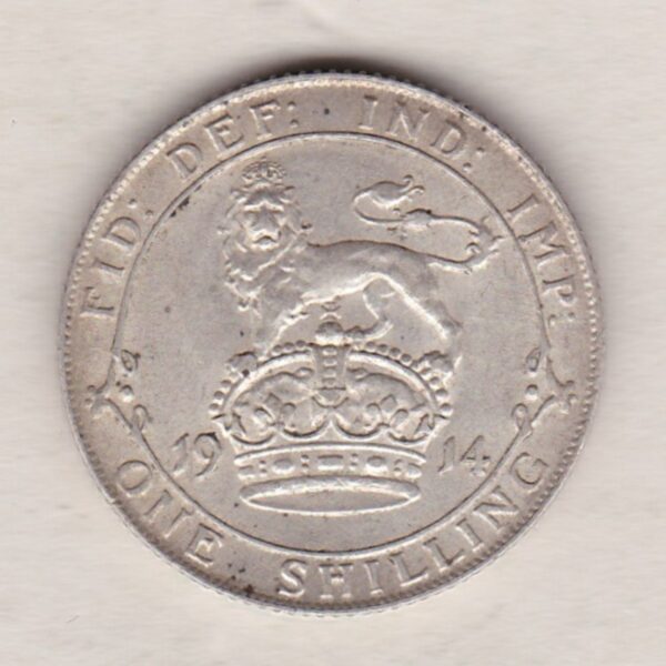 1914 Silver Shilling coin featuring King George VI on the Obverse. The Reverse features a crowned lion with date and denomination.