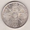 1914 Silver Florin coin. The portrait of King George V on the Obverse. The crowned cruciform shields around central Garter star on the reverse.