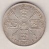 1916 Silver Florin coin. The portrait of King George V on the Obverse. The crowned cruciform shields around central Garter star on the reverse.