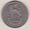 1930 Silver Shilling coin featuring King George VI on the Obverse. The Reverse features a crowned lion with date and denomination.