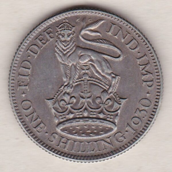 1930 Silver Shilling coin featuring King George VI on the Obverse. The Reverse features a crowned lion with date and denomination.