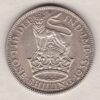 1933 Silver Shilling coin featuring King George VI on the Obverse. The Reverse features a crowned lion with date and denomination.