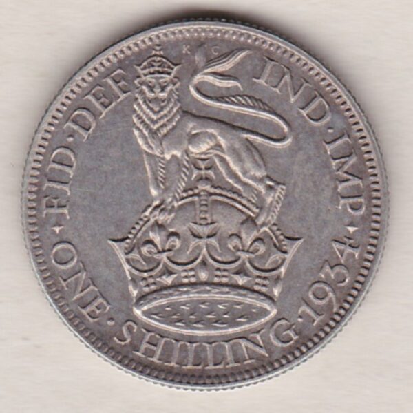 1934 Silver Shilling coin featuring King George VI on the Obverse. The Reverse features a crowned lion with date and denomination.