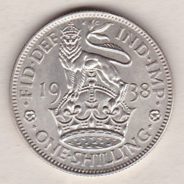 1938 English Silver Shilling coin featuring King George VI on the Obverse. The Reverse features a crowned lion with date and denomination.