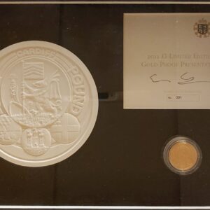 2011 Gold Proof One Pound Cardiff coin. This coin comes in a wooden presentation frame with plaster mould and certificate number 0001.