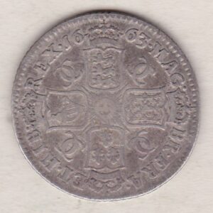 1663 silver shilling coin featuring the laureate or draped bust of King Charles II on the Obverse. The crowned cruciform shields on the Reverse.