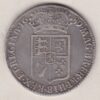 1689 Silver Halfcrown coin. The obverse features King William and Queen Mary. The reverse features the first quartered shield of arms.