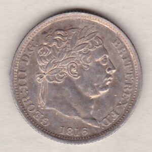 1816 silver shilling coin featuring King George III on the Obverse. The Reverse features an ornate crowned Royal shield overlaid with another shield.