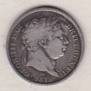 1819 Overstruck Silver Shilling coin featuring King George III on the Obverse. The Reverse features an ornate crowned Royal shield.