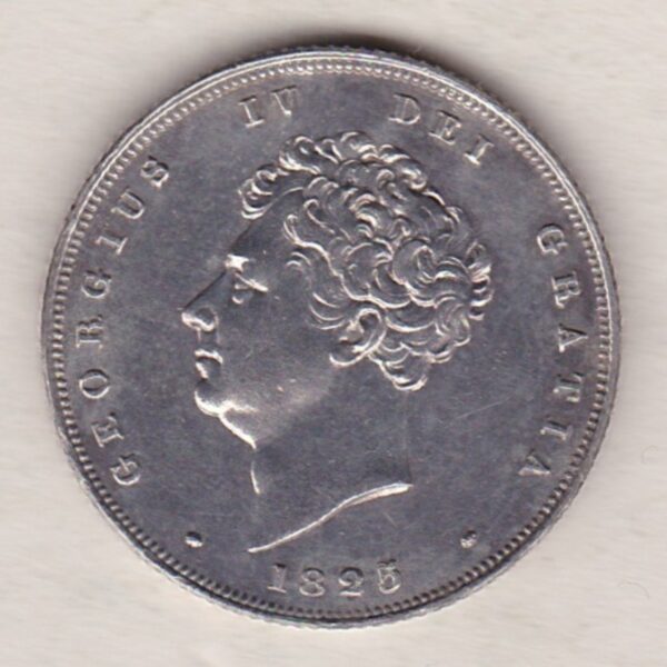 1825 silver shilling coin featuring King George IV on the Obverse. The Reverse has a crowned lion, legend around, national flower emblems below.