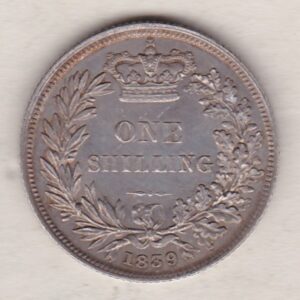 1839 silver shilling coin featuring Queen Victoria young head on the Obverse. The Reverse has a crown, laurel and oak leaves within an open wreath.