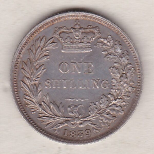 1839 silver shilling coin featuring Queen Victoria young head on the Obverse. The Reverse has a crown, laurel and oak leaves within an open wreath.