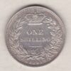 1841 silver shilling coin featuring Queen Victoria young head on the Obverse. The Reverse has a crown, laurel and oak leaves within an open wreath.