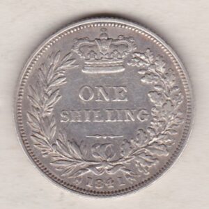 1841 silver shilling coin featuring Queen Victoria young head on the Obverse. The Reverse has a crown, laurel and oak leaves within an open wreath.