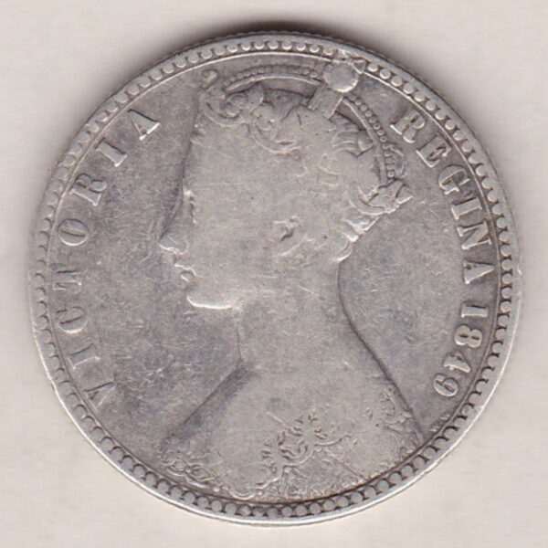 1849 Silver Godless Florin coin has a crowned bust of Queen Victoria on the Obverse. The Reverse has the cruciform shields of England, Ireland & Scotland.