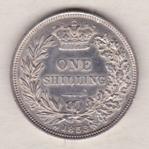 1853 silver shilling coin featuring Queen Victoria young head on the Obverse. The Reverse has a crown, laurel and oak leaves within an open wreath.