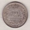 1856 silver shilling coin featuring Queen Victoria young head on the Obverse. The Reverse has a crown, laurel and oak leaves within an open wreath.