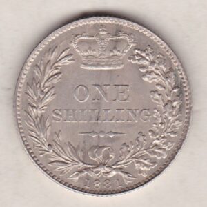 1881 silver shilling coin featuring Queen Victoria young head on the Obverse. The Reverse has a crown, laurel and oak leaves within an open wreath.