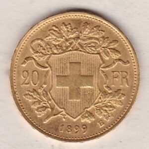 1899 B Switzerland Gold Twenty Francs coin features a female figure on the obverse. The Swiss shield surrounded by oak leaves on the Reverse.