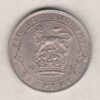 1923 Silver Sixpence coin featuring King George V on the Obverse. The Reverse features a crowned lion with date and denomination.