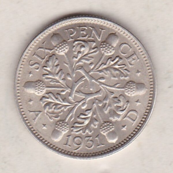 1931 Silver Sixpence coin featuring King George V on the Obverse. The Reverse features three oak sprigs with date and denomination.