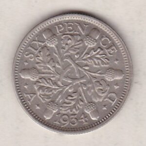 1934 Silver Sixpence coin featuring King George V on the Obverse. The Reverse features three oak sprigs with date and denomination.