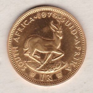 1976 South Africa Gold One Rand coin. The obverse features the portrait of Jan van Riebeeck. The springbok on the Reverse.