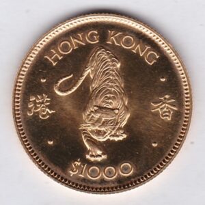 1986 Hong Kong Gold 1000 Dollars Coin. The obverse features the portrait of Queen Elizabeth II. The coin was issued to commemorate the year of the tiger.