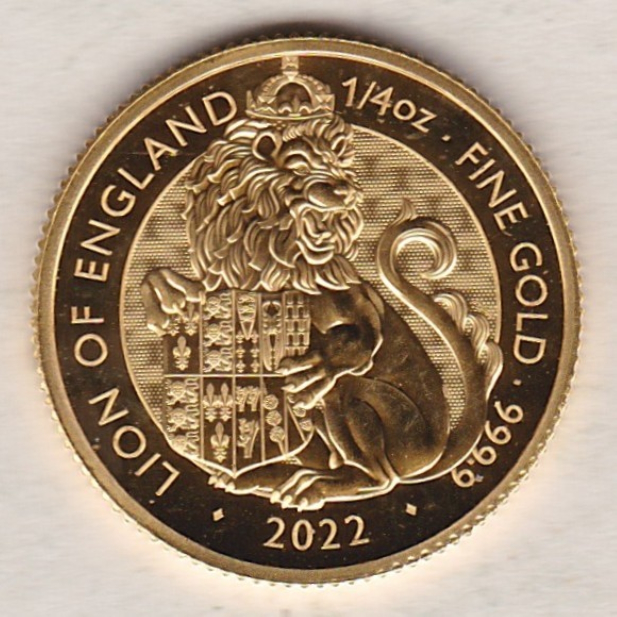 2022 Gold Quarter Ounce Lion Of England Coin. This coin features Queen Elizabeth II on the obverse. The Lion Of England on the reverse.