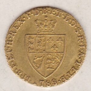 1788 Gold Half Guinea Coin featuring the laureate head portrait of King George III on the obverse. The reverse features the crowned quartered shield.