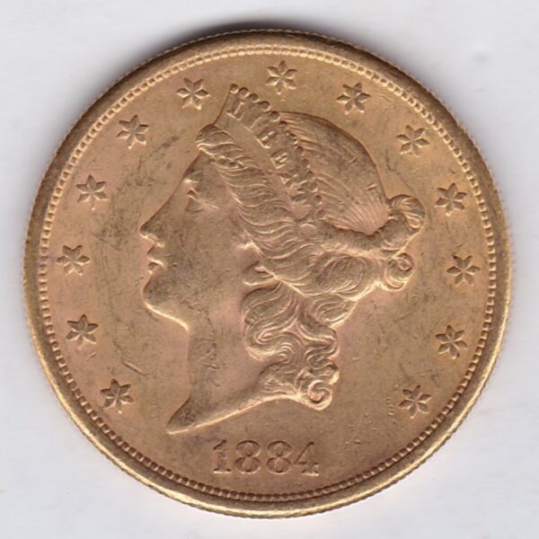 1884 S USA Twenty Dollars coin featuring the Lady Liberty on the Obverse. The eagle with a shield on its chest completes the Reverse.