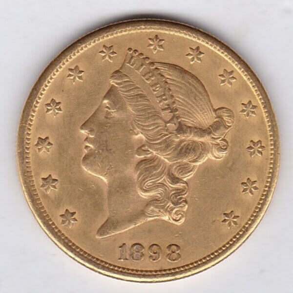 1898 S USA Twenty Dollars coin featuring the Lady Liberty on the Obverse. The eagle with a shield on its chest completes the Reverse.