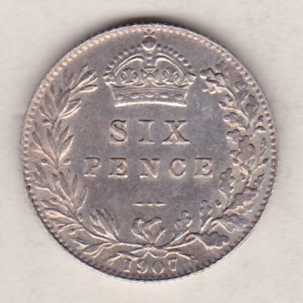 1907 Silver Sixpence coin featuring King George V on the Obverse. The Reverse features a crowned denomination within wreath.