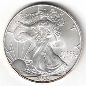 2002 Silver USA One Ounce Eagle. The liberty is on the obverse, The eagle is on the reverse. The coin contains one ounce of 999 fine silver.