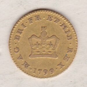 1799 Gold Third Guinea Coin featuring the laureate head portrait of King George III on the obverse. The reverse central crown with legend around and date.