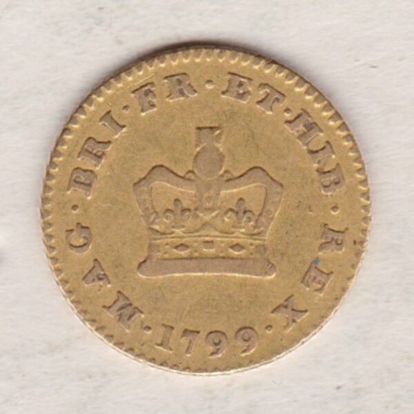 1799 Gold Third Guinea Coin featuring the laureate head portrait of King George III on the obverse. The reverse central crown with legend around and date.