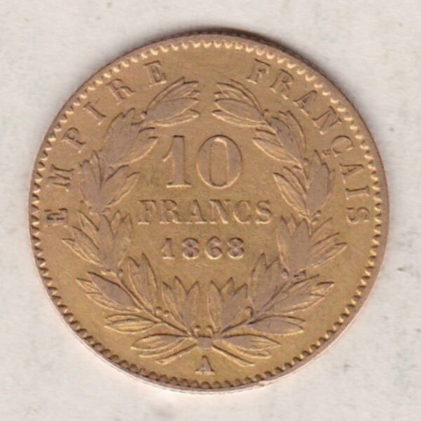 1868 A France Gold Ten Francs coin featuring Napoleon III on the Obverse. A wreath of laurels, date and mint mark on the Reverse.
